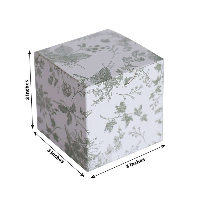 Decorative floral-patterned cube box, 3x3 inches.
