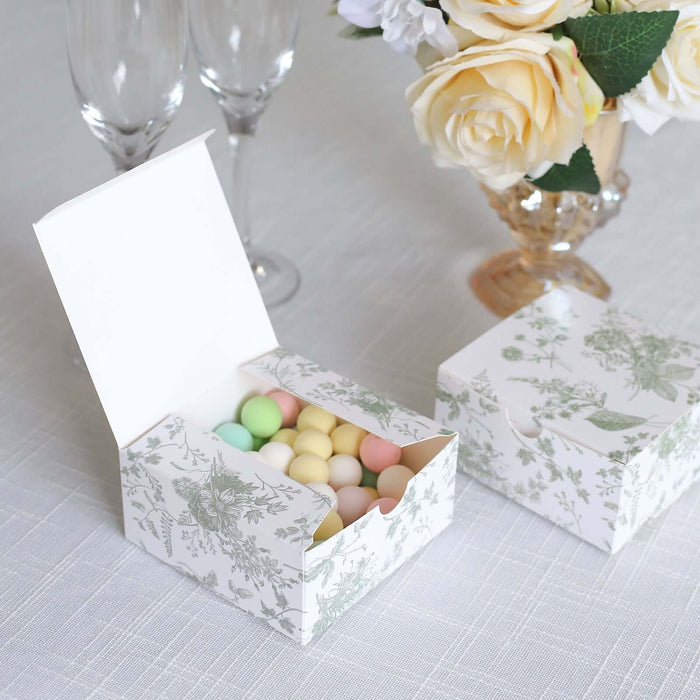 Decorative gift box filled with colorful candies, elegantly displayed on a table.