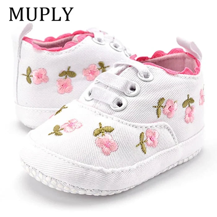 Home Sweet Home baby girl floral embroidered first walker shoes with soft soles, designed for comfortable crib walking.