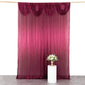 Burgundy draped fabric backdrop with pleats, styled for photography.