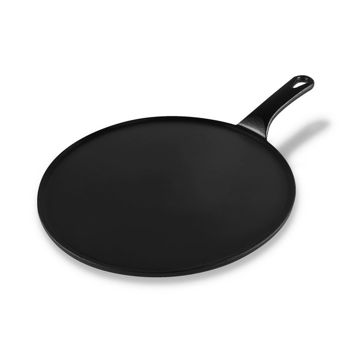 Black frying pan on a white background