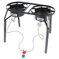 A dual burner high pressure cooker with two cast aluminum burners, stainless steel braided LPG hoses, and a black welded steel frame on a white background.