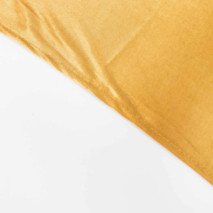 Golden fabric corner on a plain background.