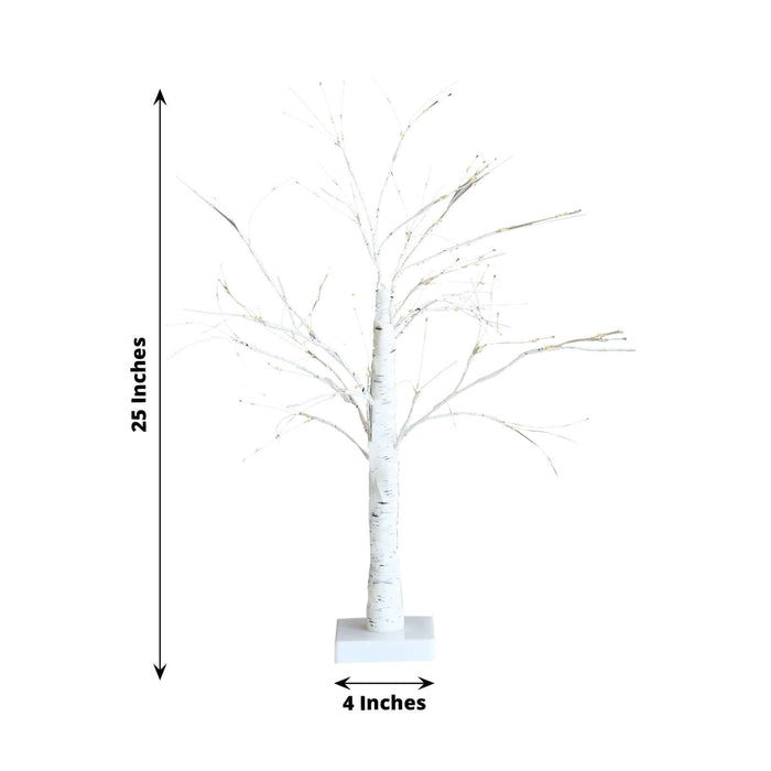 White birch tree decoration, 25 inches tall and 4 inches wide.