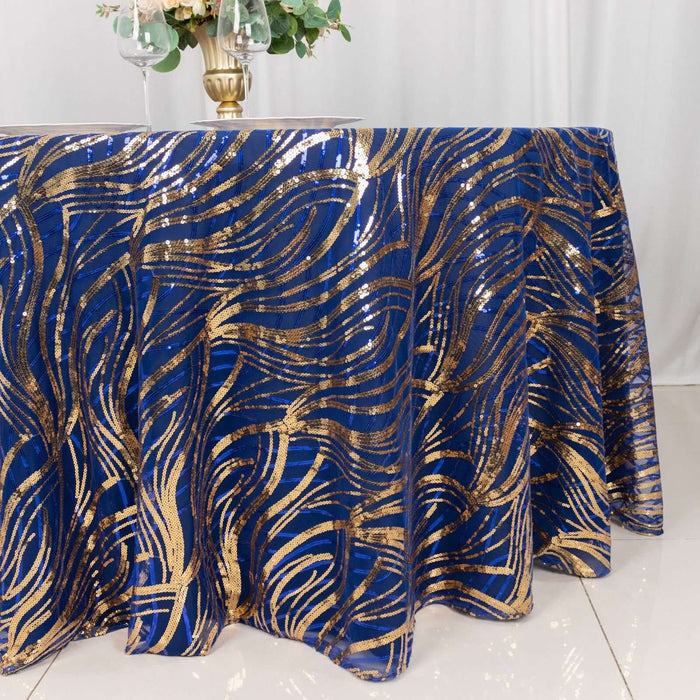 Navy blue and gold sequined tablecloth with wavy pattern.