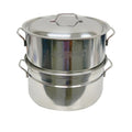 A stainless oyster steamer stockpot on a white background