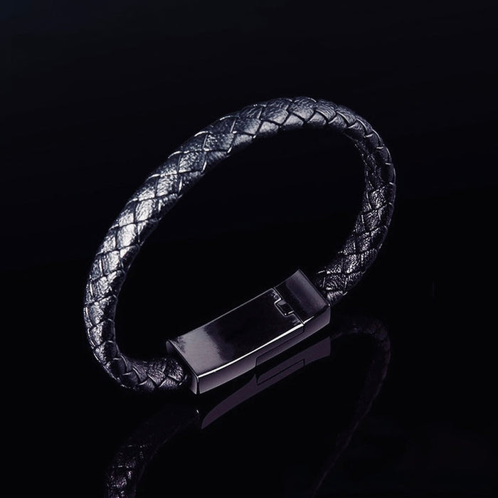 Beckett charging bracelet with sleek black design and integrated charging port, stylish wearable tech accessory.