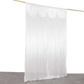 White sheer curtain draped elegantly on a rod for soft lighting.