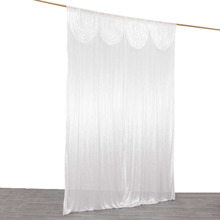 White sheer curtain draped elegantly on a rod for soft lighting.